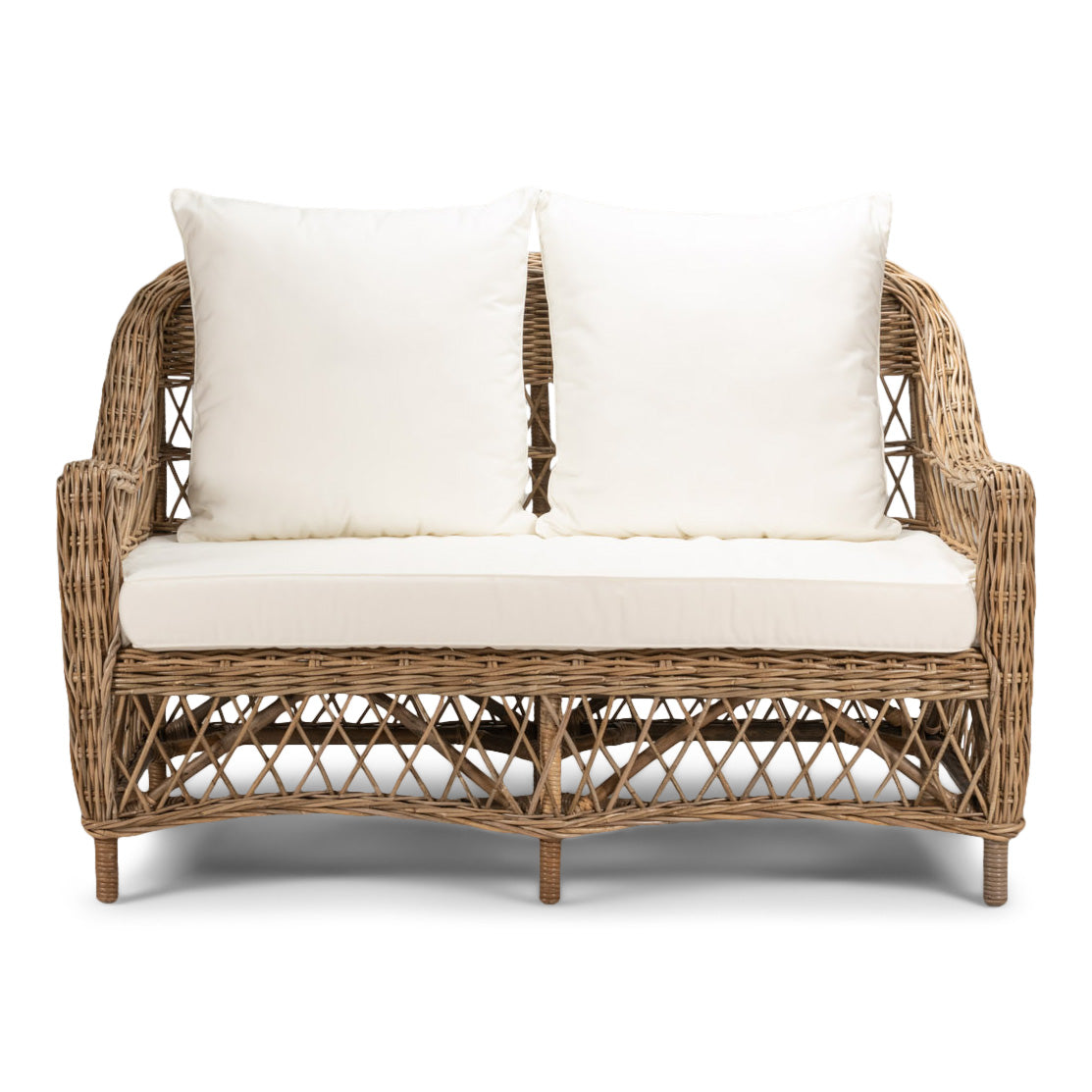 Wicker loveseat with white cushions on a white background