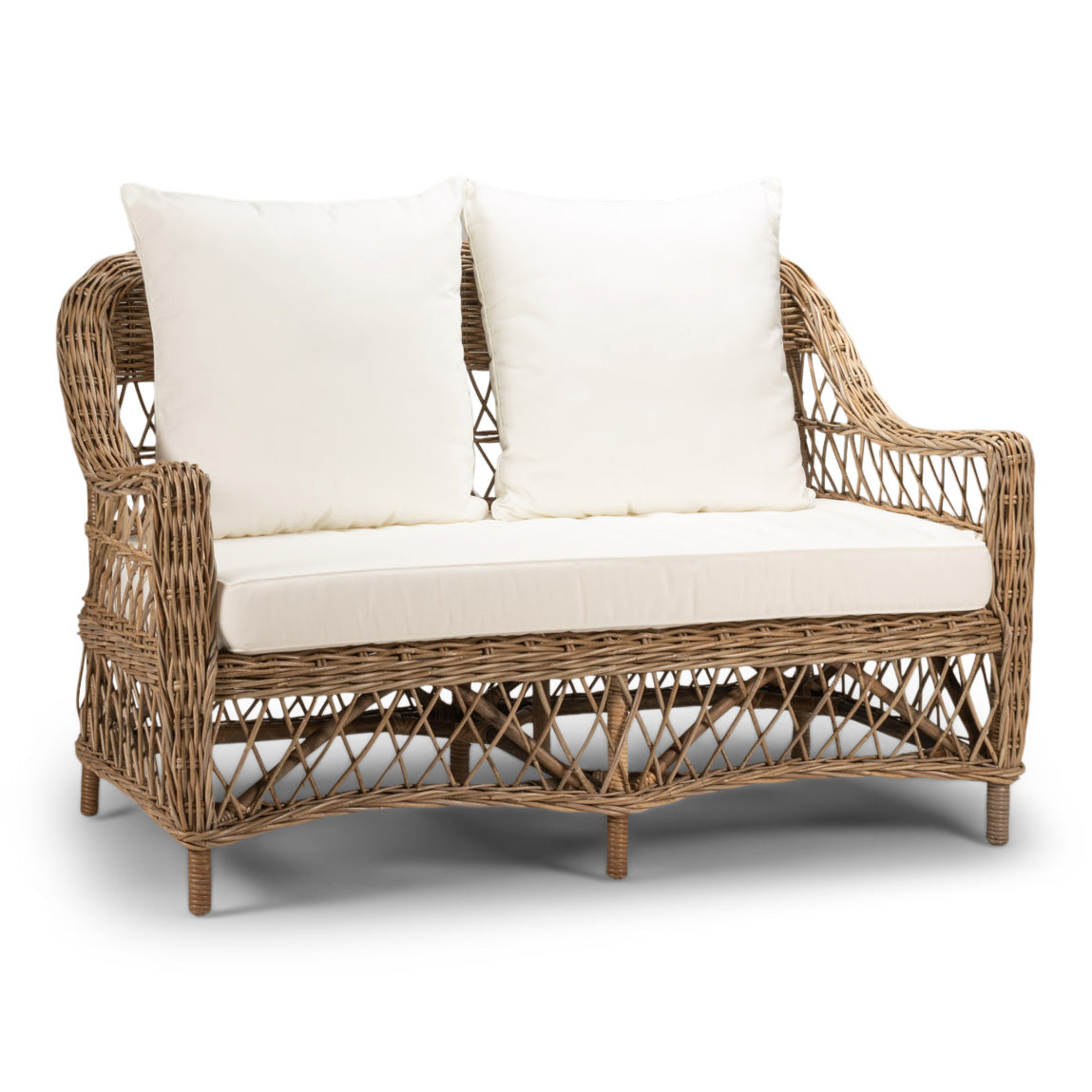 Wicker loveseat with white cushions on a white background
